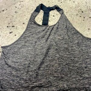 Under armour workout tank, size extra large. Gray with strappy back detail